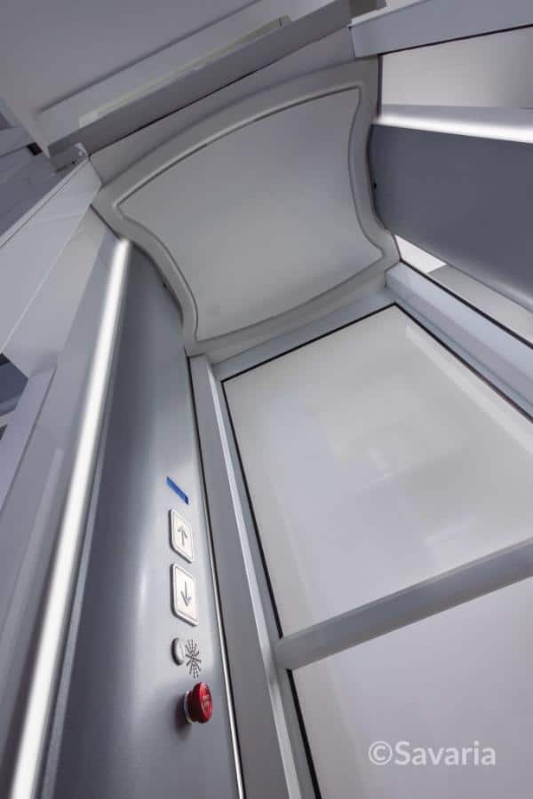 Inside view of Savaria Luma elevator cabin with a modern control panel.